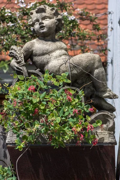 stock image Putti figure on a wall, Nrdlingen, Bavaria, Germany, Europe 