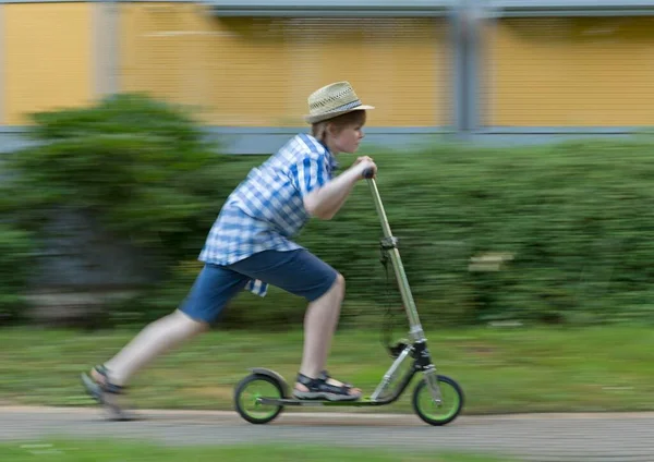 Boy Riding Scooter — Stock Photo, Image