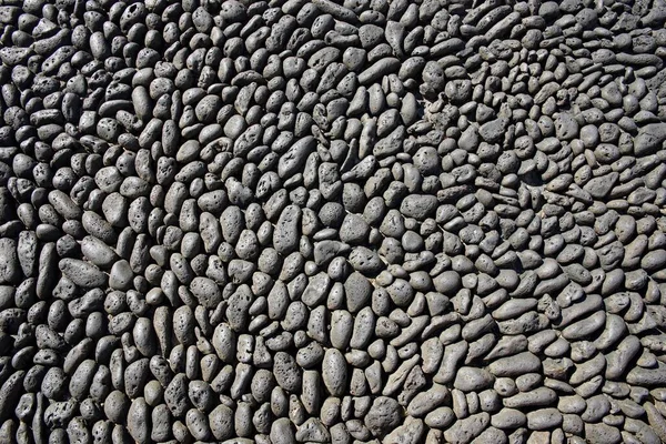 Επιφάνεια Από Μαύρες Πέτρες Λάβας Απωθητικά Βράχια Εικόνα Φόντου — Φωτογραφία Αρχείου