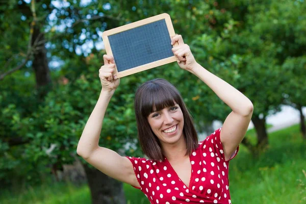Young Woman Holding Blackboard Her Hands — Stock Photo, Image
