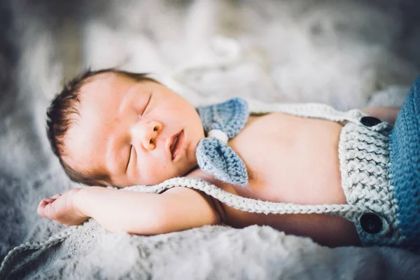 Newborn Baby Boy Sleeping Blue Grey Knitted Bow Tie Trousers — Stock Photo, Image
