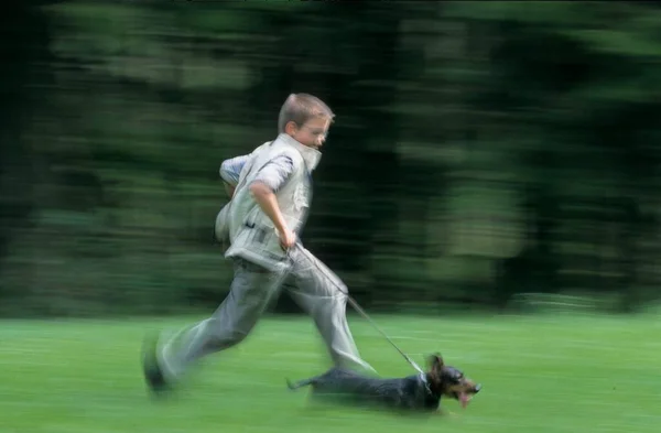 Little Boy Running Fast Dog — Stock Photo, Image
