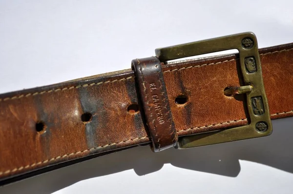 Leather belt, belt tighten background view