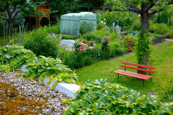 Country garden with garden bench