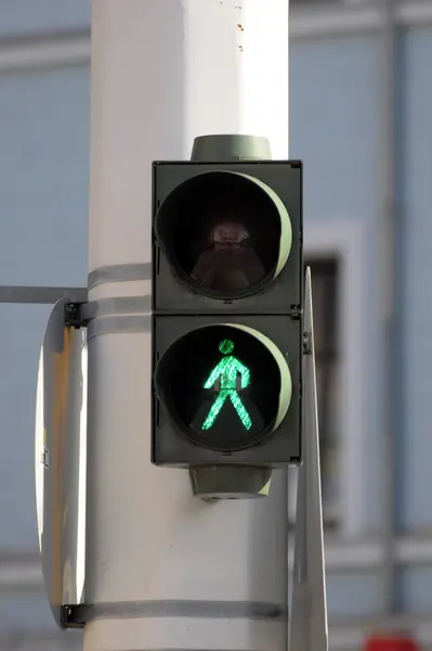 Stock image Pedestrian lights, green background view