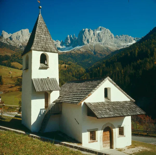 stock image Chapel, small village church, Dolomites St. Cyprian with Rose Garden, South Tyrol, Italy, Europe