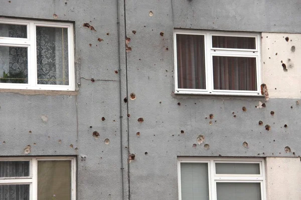 Remembrance of the Bosnian War on a residential building in Bihac Bosnia-Herzegovina