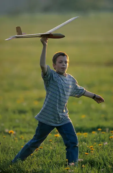 Little Boy Plays Glider Meadow — Stock Photo, Image