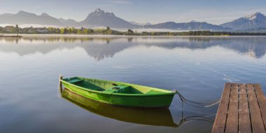 Green rowboat, lake Hopfensee, Hopfen am See, near Fuessen, Ostallgaeu, Allgaeu, Bavaria, Germany, Europe clipart