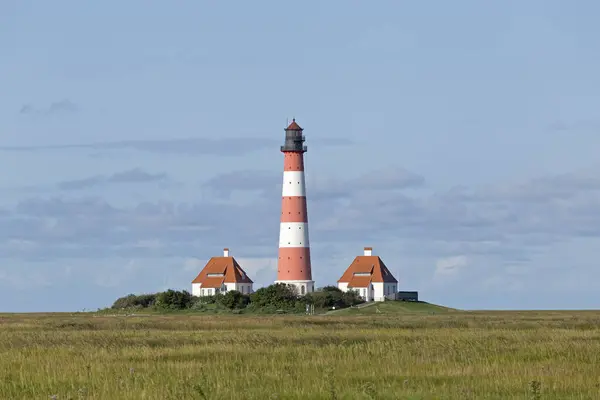 stock image Westerhever Lighthouse with cloud sky, Westerhever, Schleswig-Holstein, Germany, Europe