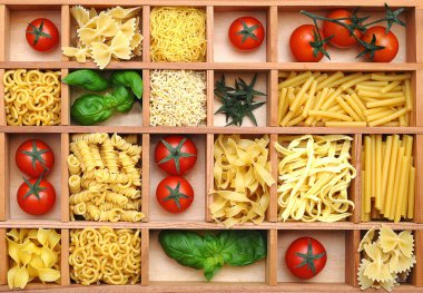 Type case with pasta, basil and tomatoes clipart