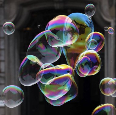 Large soap bubbles fly through the air, Antwerp, Belgium, Europe clipart