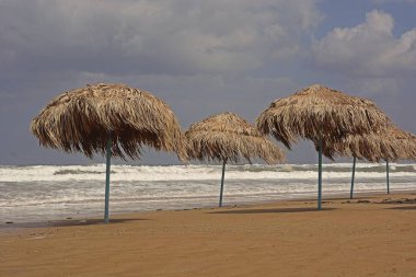 Sunshades at the beach of Georgioupolis, Crete, Greece, Europe clipart