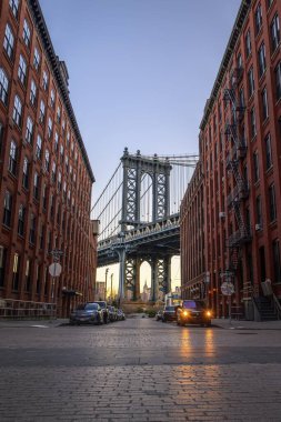 View from Main Street to Manhattan Bridge and Empire State Building, at sunrise, blue hour, Dumbo, Brooklyn, New York, USA, North America clipart