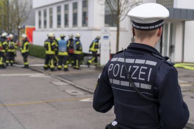 Policeman in action, Stuttgart, Germany, Europe clipart