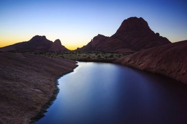 Spitzkoppe in front of evening sky, Erongo region, Namibia, Africa clipart