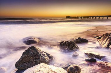 Beach at a former pier, jetty at sunset, Atlantic, Swakopmund, Erongo Region, Namibia, Africa clipart