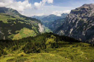 View of Mrren and the Lauterbrunnen Valley, Jungfrau-Aletsch-Bietschhorn in the background, Bernese Oberland, Canton of Bern, Switzerland, Europe  clipart