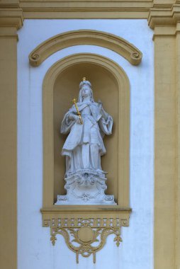 Sculpture by Empress Cunigunde of Luxembourg, 980-1033, in a niche at the parish church, Knigsfeld, Upper Franconia, Bavaria, Germany, Europe  clipart