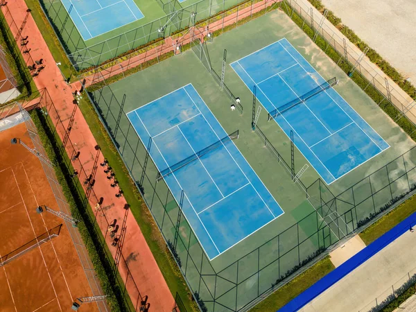 stock image Aerial view of empty blue hard tennis court on a sunny day