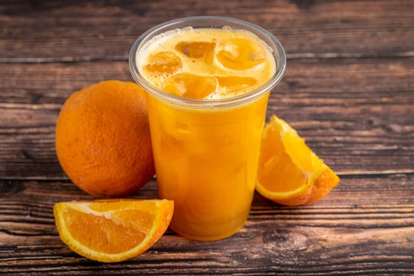 Freshly Squeezed Orange Juice Ice Cubes Wooden Table — Stock Photo, Image