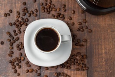 Filter coffee brewed in a filter coffee machine in a white porcelain cup