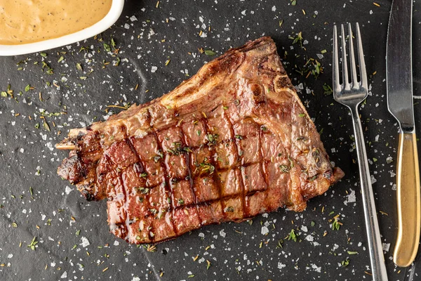 New York Strip Loin on stone cutting board at steak house