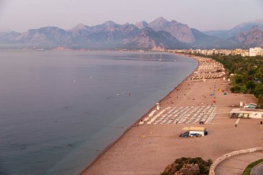 Aerial view of Konyaalti beach in Antalya Turkey at sunrise in the morning clipart