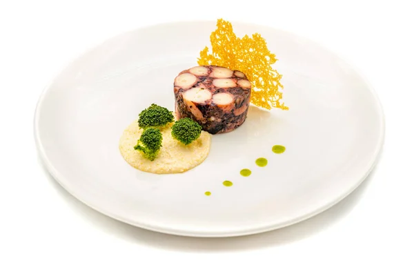 stock image Octopus terrine or octopus carpaccio with sauces on a white porcelain plate