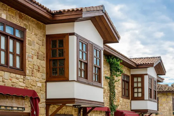 stock image Restored houses with bay windows on the historical streets of Side Antalya