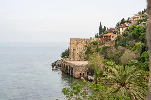 stock image Historical Alanya Shipyard and Kizil Kule walls located in Alanya district of Antalya