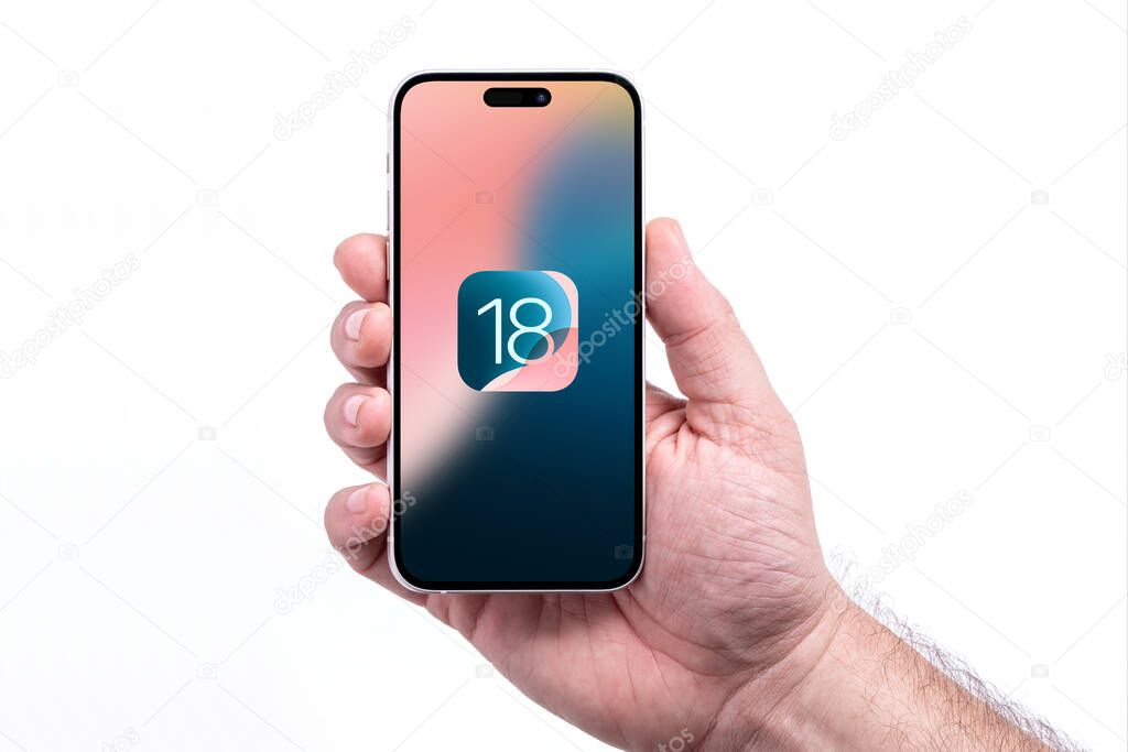 Antalya, Turkey - June 11, 2024: iPhone 15 Pro screen with new iOS 18 logo, the next operating system for Apple's smartphones will be released