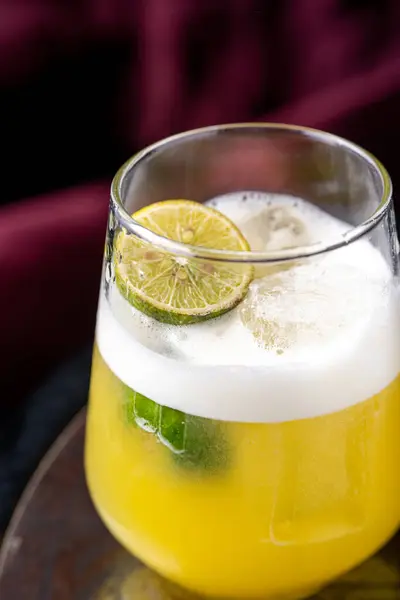 stock image Satsuma cocktail in glass on dark background