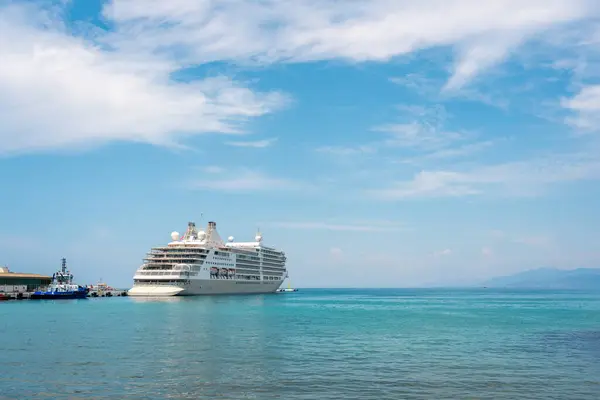 stock image Kusadasi, Turkey - July 4, 2024: A cruise ship anchored in the port of Kusadas, Turkey, waiting for its passengers