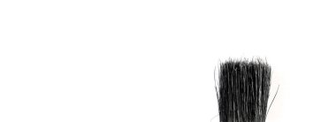 Beyaz arka planda siyah bir fırçanın yakın plan görüntüsü