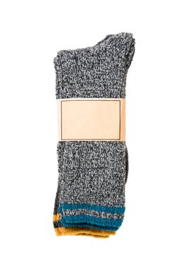 Top view of grey woolen winter socks on white background clipart