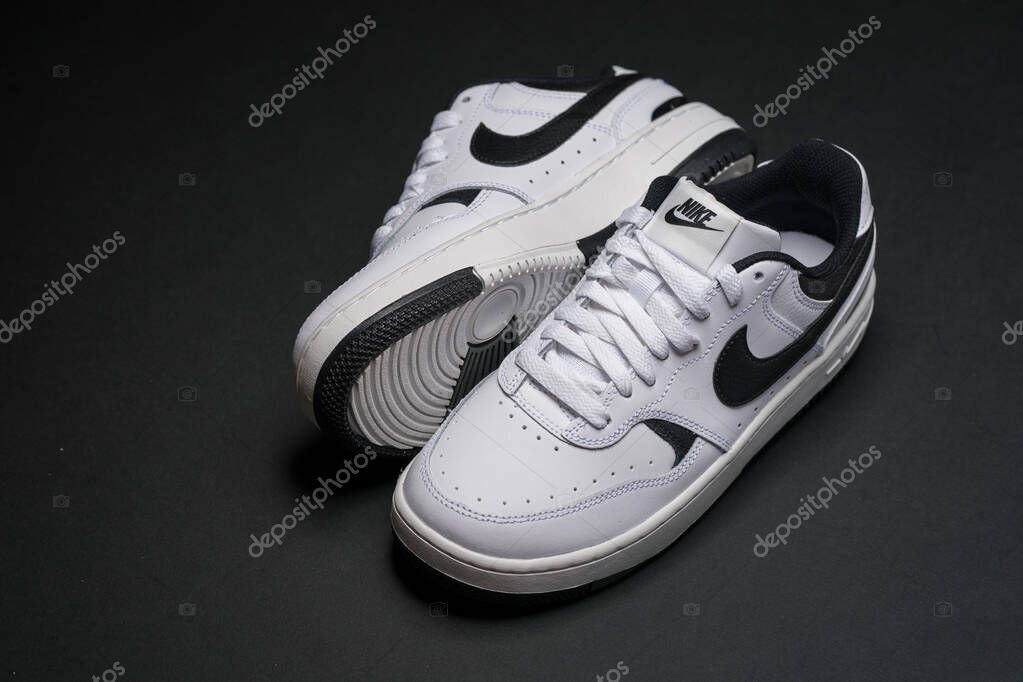 Antalya, Turkey - April 15, 2025: White Nike Gamma Force sneakers on black background