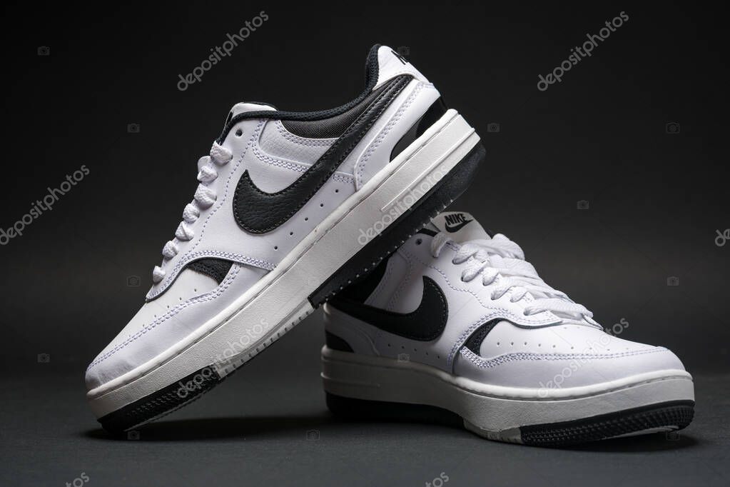 Antalya, Turkey - April 15, 2025: White Nike Gamma Force sneakers on black background