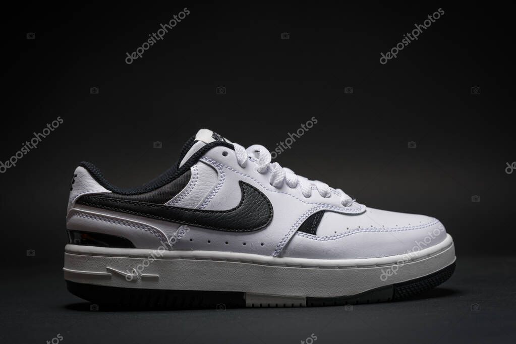 Antalya, Turkey - April 15, 2025: White Nike Gamma Force sneakers on black background