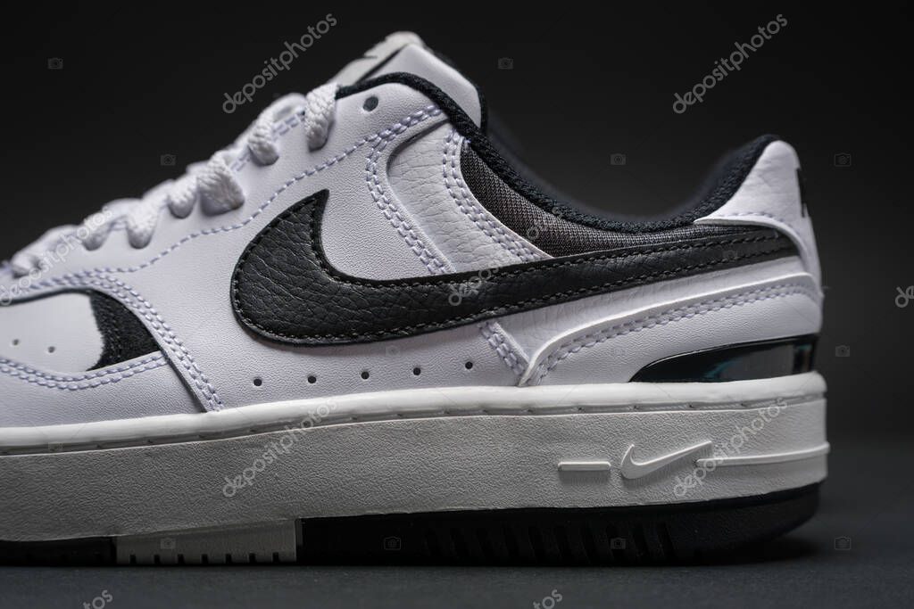 Antalya, Turkey - April 15, 2025: White Nike Gamma Force sneakers on black background
