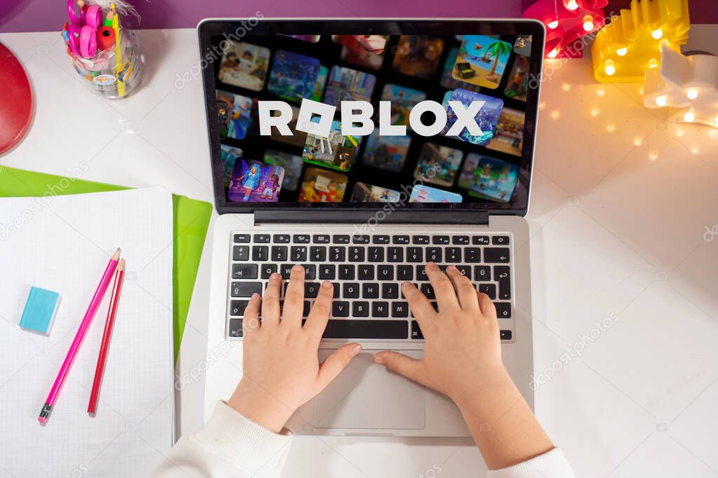 Antalya, Turkey - May 23, 2025: Little girl playing Roblox, a game very popular among children