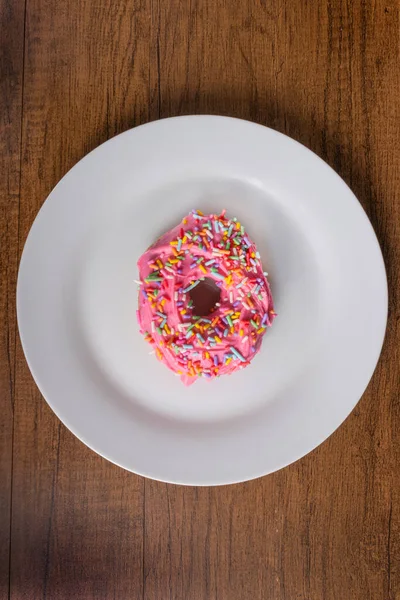 Tasty Sweet Donuts Pink Frosting Colorful Sprinkles Served White Plate — Stock Photo, Image