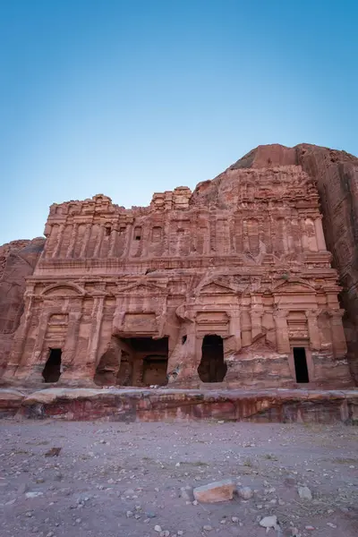 Palace Tomb, one of four royal tombs, in the historic and archaeological city of Petra, Jordan against blue sky