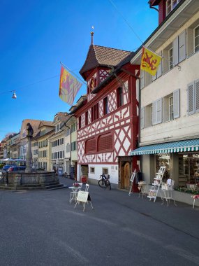 Cityscape of Sempach, Switzerland at Stadtstrasse against blue sky clipart