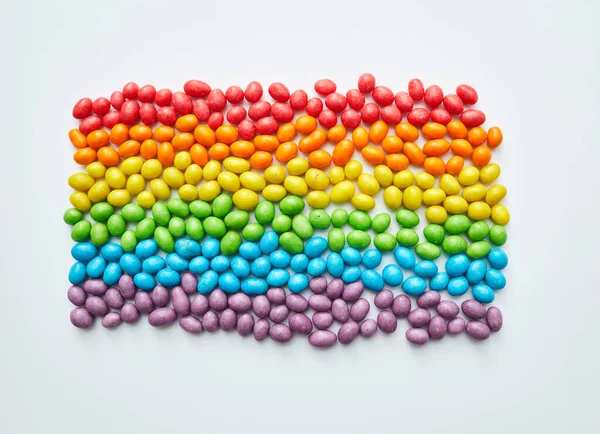 Multi Colored Candies Laid Out Shape Equality Flag White Background — Stock Photo, Image
