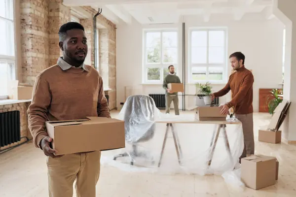 Group Young Interracial Employees Carrying Moving Boxes New Office While — Stock Photo, Image