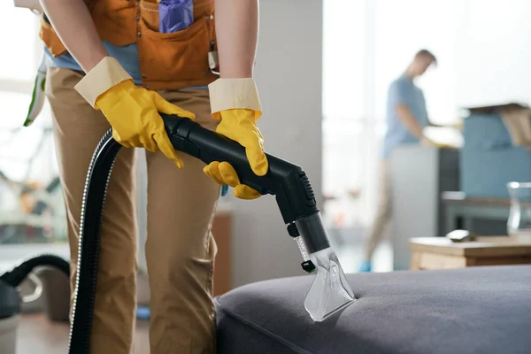 Close Cleaning Service Worker Vacuuming Furniture Apartment Her Colleague Wiping — Stock Photo, Image
