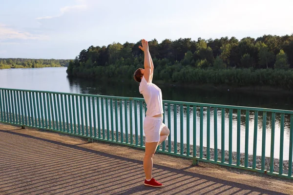 Woman Does Yoga River Embankment Sunset — Stock Photo, Image