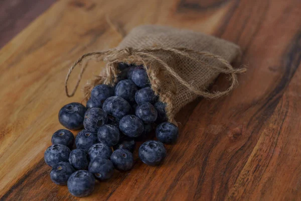 Fresh Blueberries Raffia Bag Wooden Table — Stock Photo, Image