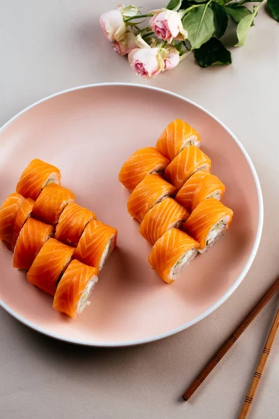 Two Types Philadelphia Sushi Rolls Plate Colored Background — Stock Photo, Image